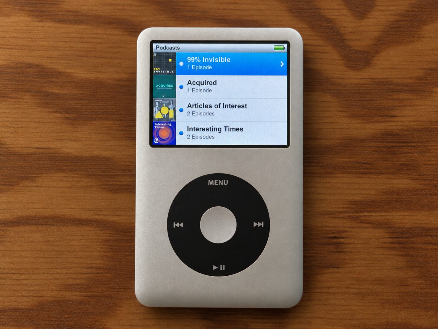 An iPod Classic showing the Podcasts menu